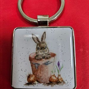 adorable metal rabbit in a flowerpot keyring